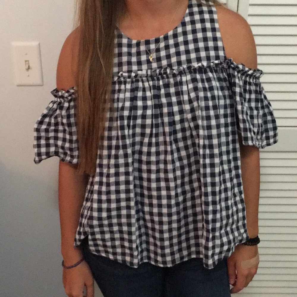 Open shouldered blue and white shirt